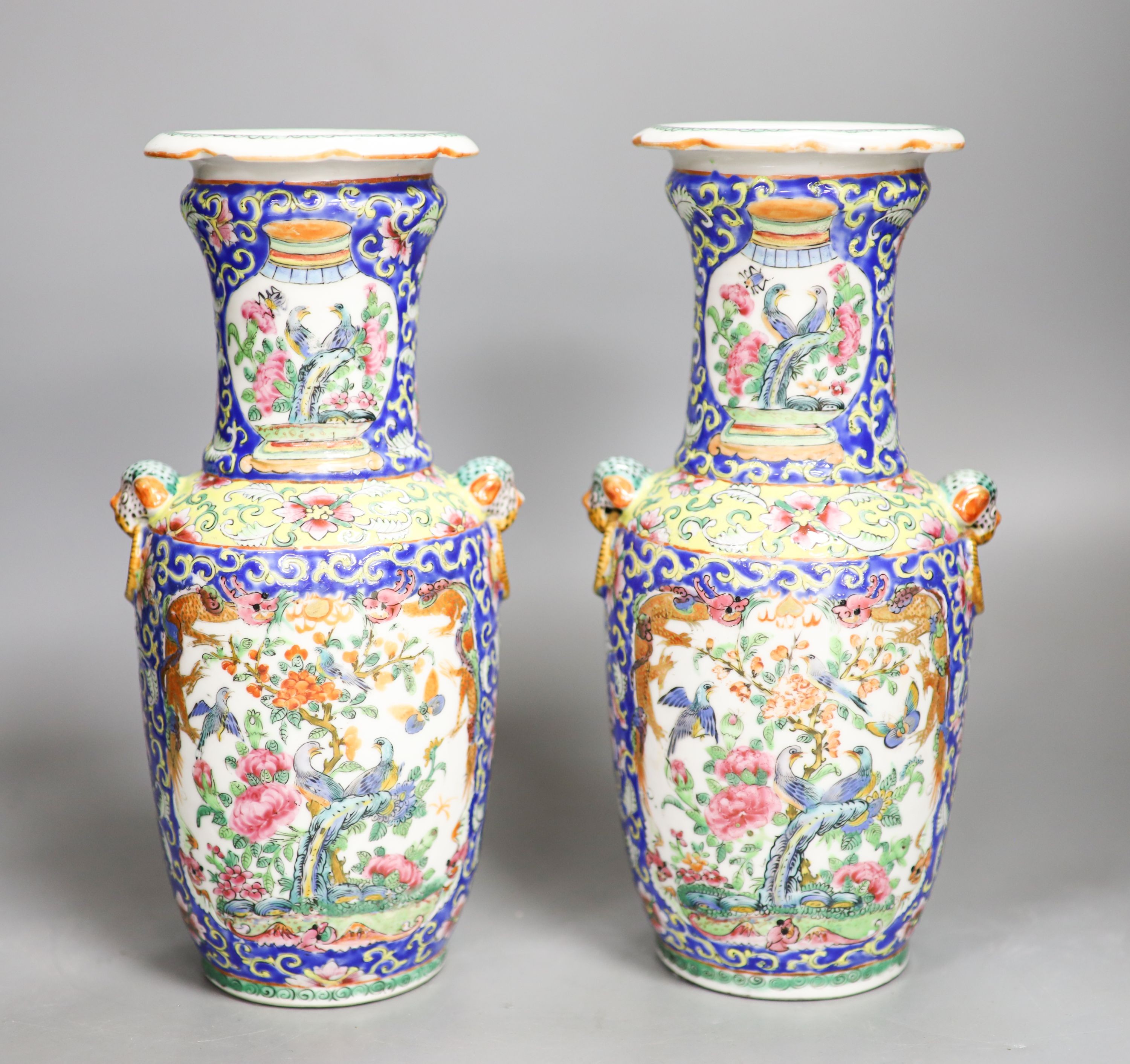 A pair of 19th century Chinese famille rose vases 24.5cm